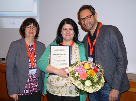 Myrofora Goutaki (centre) with the prize awarded by Katja Pier, member of the patients association management committee, and Professor Heymut Omran of the University of Münster, an expert on PCD and head of the GPP’s PCD group.